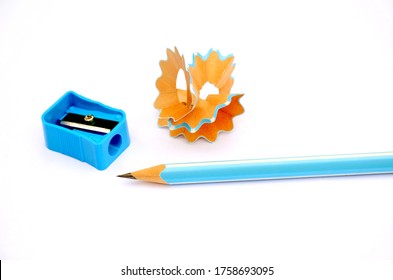 the sky blue colour pencil with sharpner and these waste background on the white