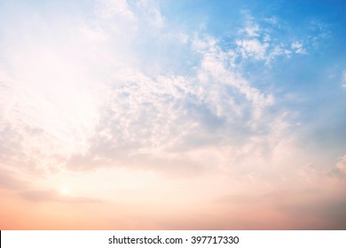 Sky blue and orange light of the sun through the clouds in the sky survive. - Powered by Shutterstock