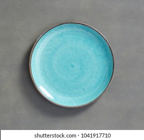 Sky Blue Swirl Melamine Plate with dark gray background 
