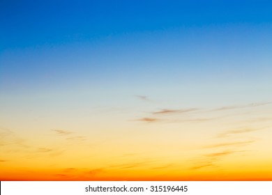 Sky, Bright Blue, Orange And Yellow Colors Sunset. Instant Photo, Toned Image. Gradient Background