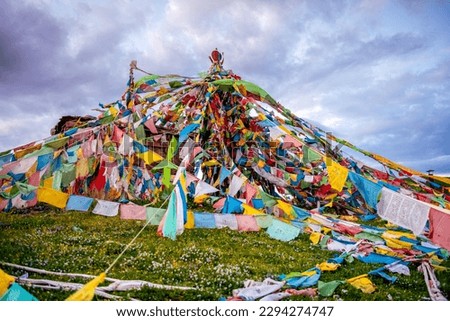 Sky burial site at Litang Tibetan Town. a famous tourist spot in Litang, Ganzi, Sichuan, China. Dramatic sunset sky