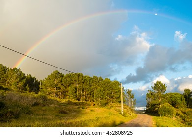 Sky changes from overcast cloudy to blue with beautiful rainbow