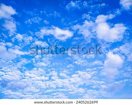 The sky was clear with white clouds and the atmosphere was peaceful.