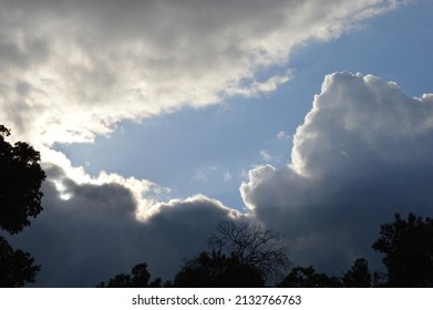 Sky Clearing After A Storm, Allowing Light To Shine Through