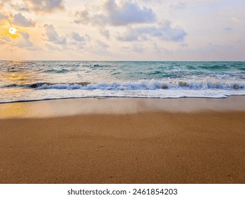 The sky cloud. Ocean waves crashing onto the shore. with the evening atmosphere. sunset view That reflects the light of the sea and the beautiful beach. Feeling vacation and relaxation with nature. - Powered by Shutterstock