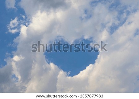 Sky, clouds forming a heart shape. Love symbol, Valentine's Day concept