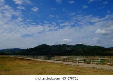 Sky with clouds and mountain.