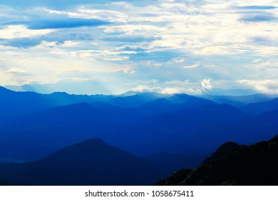 Sky with clouds and mountains