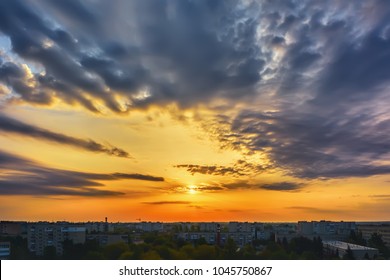 Sky With Clouds Over Morning City At Sunrise.