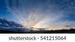 sky with clouds and sun
