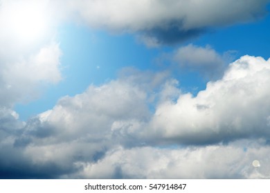 sky with clouds and sun