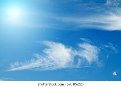 sky with clouds and sun