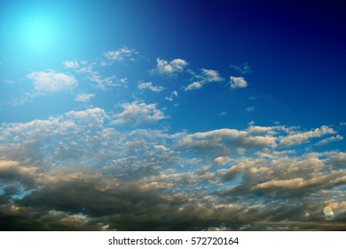 sky with clouds and sun