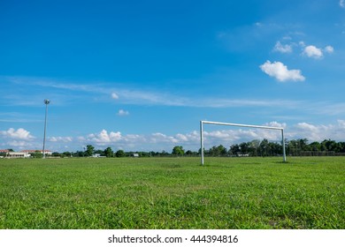 Sky and clouds view football grass with football Goal for play football - Shutterstock ID 444394816