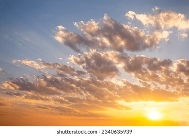 Sky and cloudscape at sunset. Nature scene background.