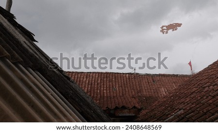 The sky is cloudy because heavy rain will fall in the tropical country of Indonesia
