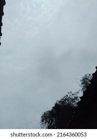 The Sky Is Cloudy With Lots Of Clouds And It Wants To Rain With A Lot Of Bamboo Trees Under It