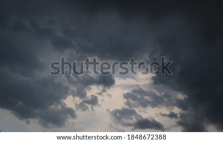 the sky was cloudy and thudering