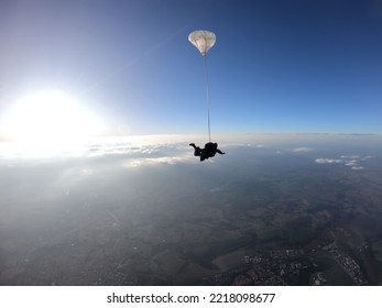 Sky Dive Tandem Friends At The Sunset.