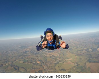 Sky Diving Asian Female Smiling