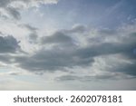 Sky with dramatic grey clouds, overcast weather.