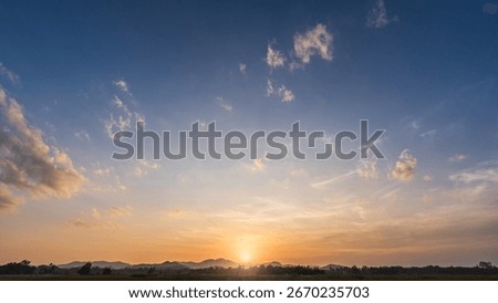 Sky dusk dramatic background, Summer season gold sunset landscape nature light clouds blue orange yellow color, Colorful sunrise sun cloud beauty, Mountain horizon beautiful sunlight weather sunshine