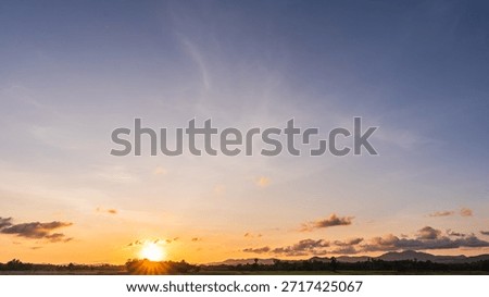 Sky dusk dramatic background, Summer season gold sunset landscape nature light clouds blue orange yellow color, Colorful sunrise sun cloud beauty, Mountain horizon beautiful sunlight weather sunshine 