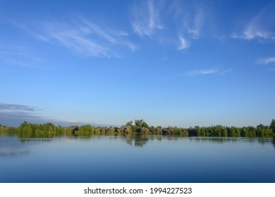 Sky With Feather Clouds In Morning Over River In Summer. Beautiful Landscape, Kind Of Fog.