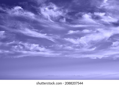 Sky with feather clouds, violet very peri color, abstract background. - Shutterstock ID 2088207544