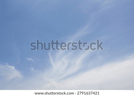 
It is a sky with feathery clouds.