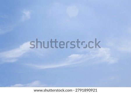 
It is a sky with feathery clouds.