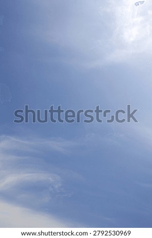
It is a sky with feathery clouds.