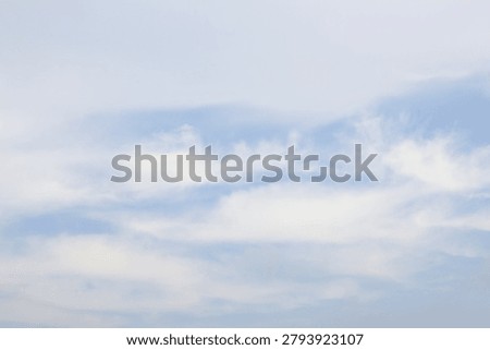 It is a sky with feathery clouds.