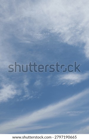 It is a sky with feathery clouds.