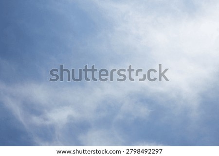 It is a sky with feathery clouds.