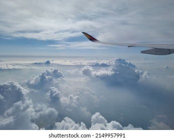 Sky from the flight. Full of clouds.