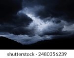 Sky full of dark clouds before the rain, storm before the change of weather, bad weather, autumn rain,  high quality professional photography
