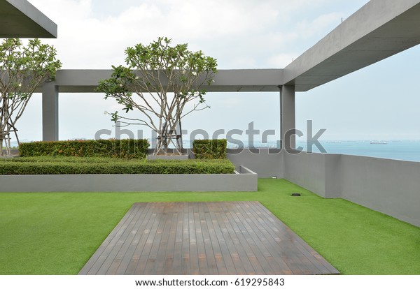sky garden\
on rooftop of condominium with blue\
sky