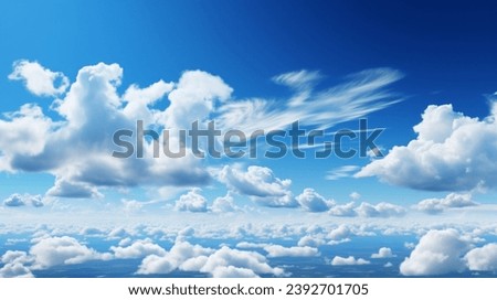 The sky has the light of the sun, the sky is blue, there are small and large clouds alternating and moving slowly, with the sunlight passing, creating a miraculous abstract shape, a hot day.