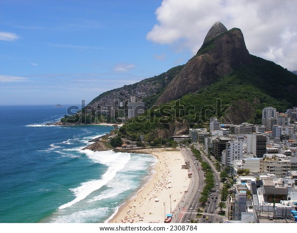 Sky, ocean, mountain, beach, and buildings in Rio\
de Janeiro