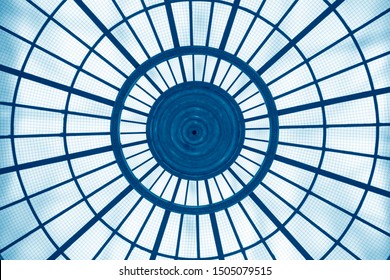 Sky In An Office. Transparent Circular Glass Roof Or Ceiling. Reworked Close-up Photo Of Modern Architecture Fragment With Round Structure. Abstract Geometric Background With Radial Lines And Sectors.