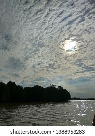 Sky patterned clouds with the hiding sun