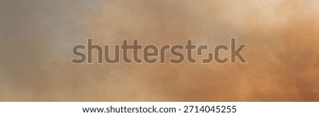 The sky is smoke-filled from spring fires of dead wood and fields, backlit by the sun, and there is a danger of forest fires near the city.