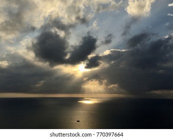 Sky sunset clouds with dark ocean