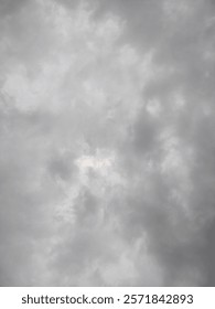 the sky is thickly cloudy gray
