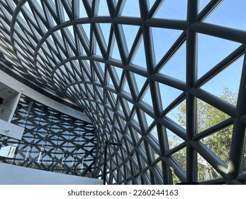  Sky view Dome with windows. The clear glass roof can see through the sky. Center of excellence for Temperate species conservation. Rayong Thailand - Powered by Shutterstock