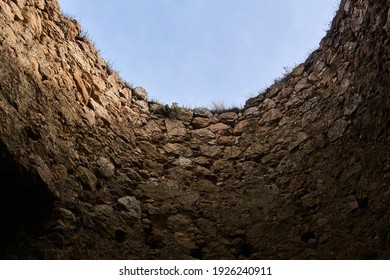 sky view from a dungeon with stone walls