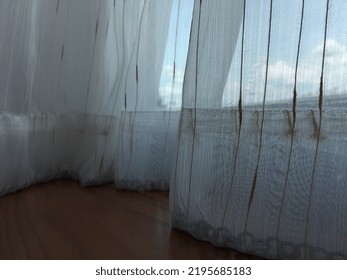 Sky View Through  White With Golden Line Sheer Curtain On Teak Wooden Floor