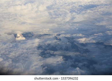 The sky from the view through the window on the plane