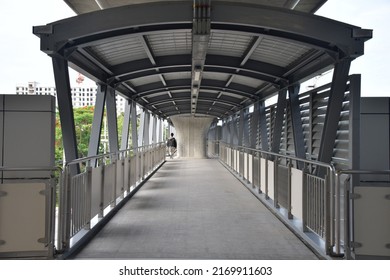 Sky walk bridge links to the bts sky train as modern transportation networks in Bangkok, Thailand. Transport and modern city image collection. - Shutterstock ID 2169911603